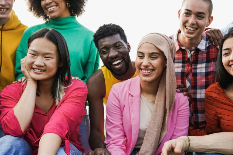 Happy multiracial people having fun together at park outdoor - Diversity and friendship concept